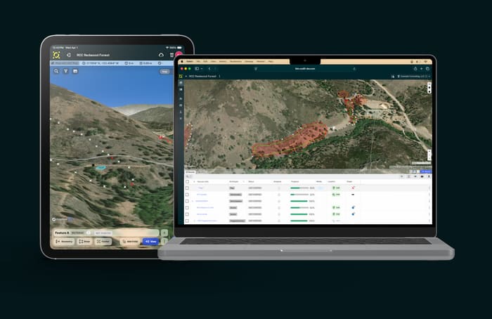 Codifi on an iPad and a MacBook, on the same forest survey project. The iPad shows the survey’s features on a 3D satellite map of a wooded hillside. The laptop’s web app shows the project’s map, with a flagged boundary in red, above a table of its records and their progress.