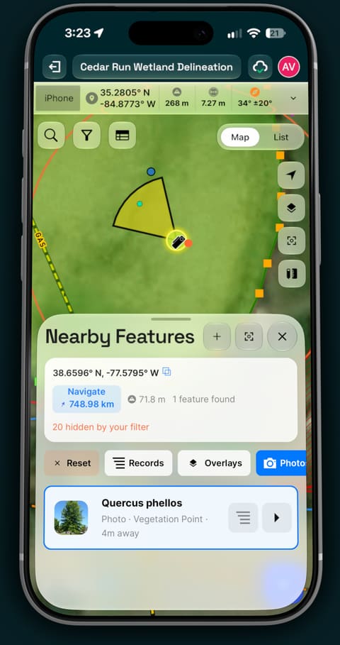 A phone showing a photo’s location and view cone on the project map.