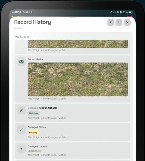 A tablet showing a record’s history of edits and photos.